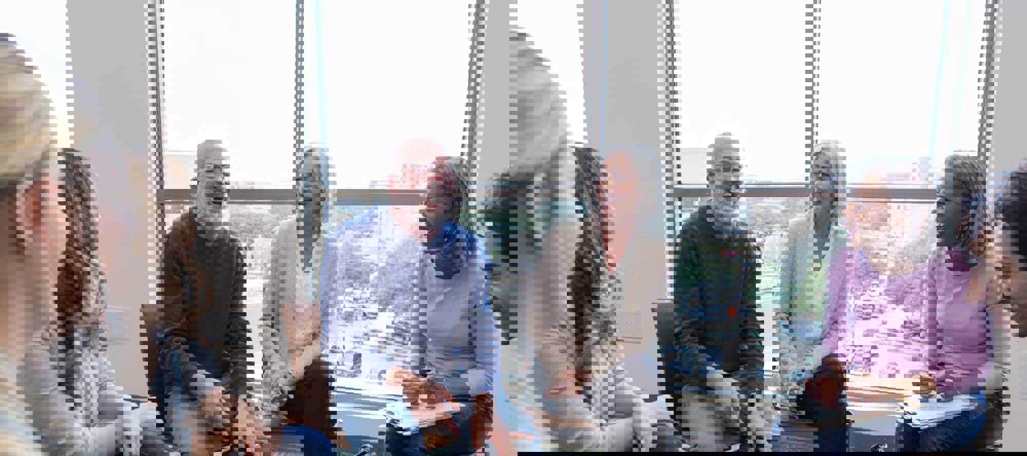 people sat on chairs in a circle